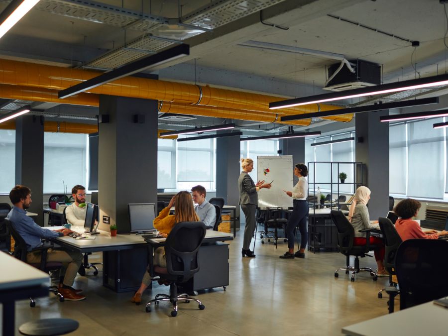 Modern office with yellow pipes featuring colors that increase productivity