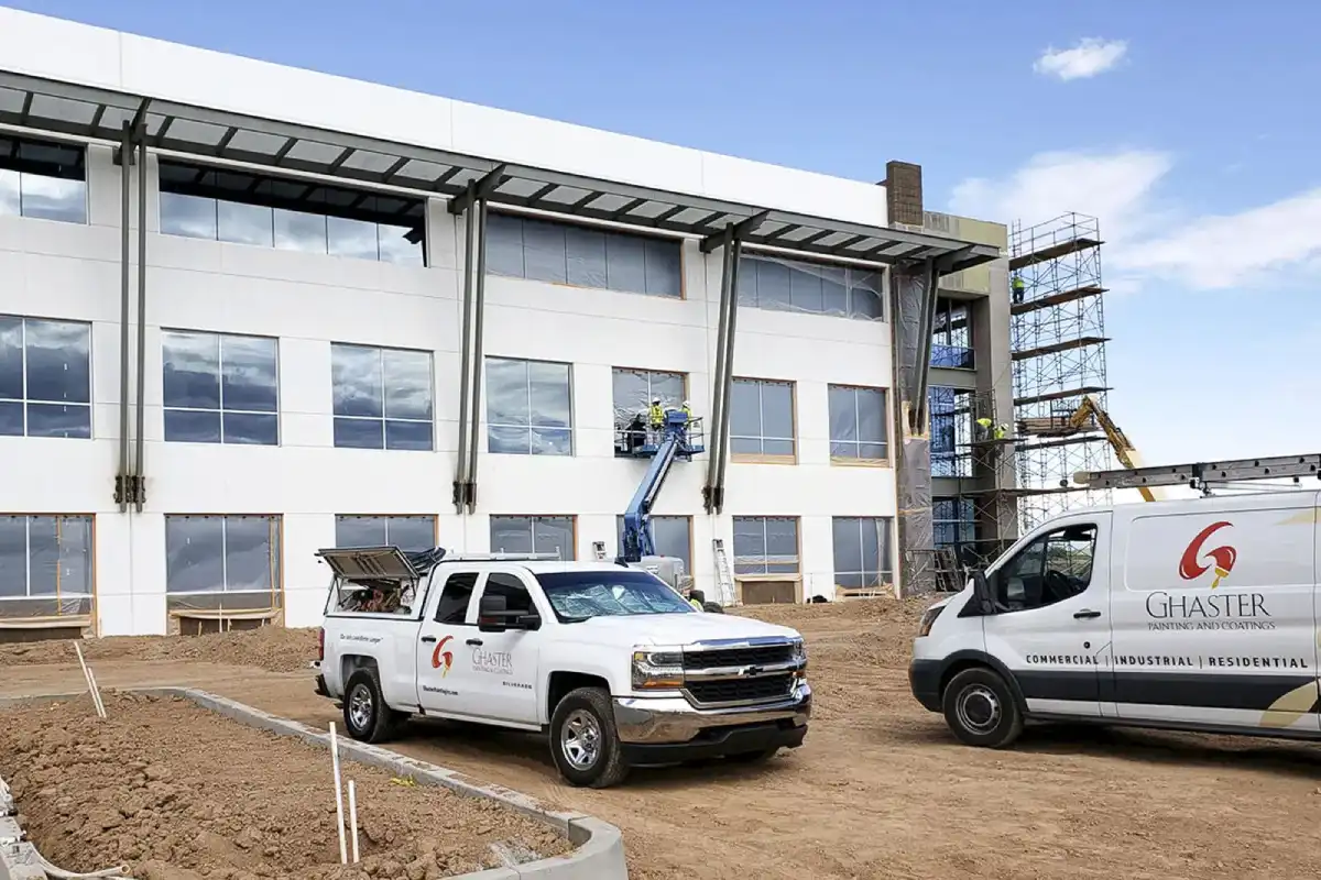 Master painters preparing the building for painting, ensuring meticulous preparation and attention to detail.