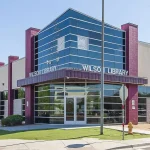 A side view of Wilson Library, showcasing its newly painted exterior.