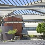 A view of a commercial building, capturing its architectural features and surroundings.