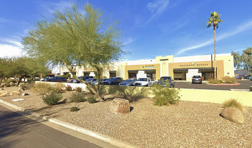 Southwest Greens commercial building with desert landscaping