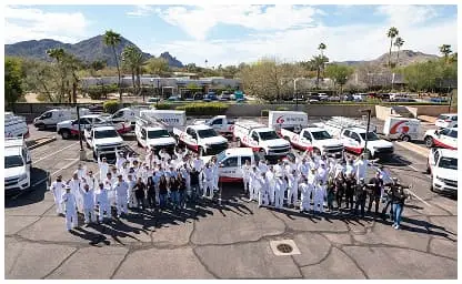 Commercial printing team and fleet showcasing company operations in Arizona