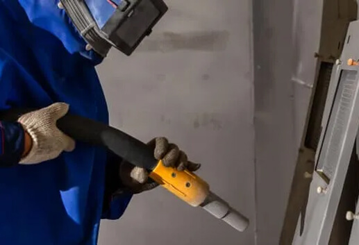 Industrial sandblasting surface preparation for coating and painting on structural metal