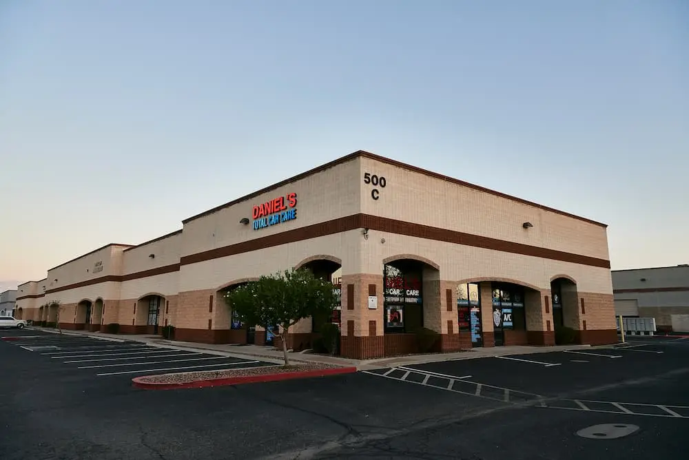 Exterior painting of commercial retail strip building