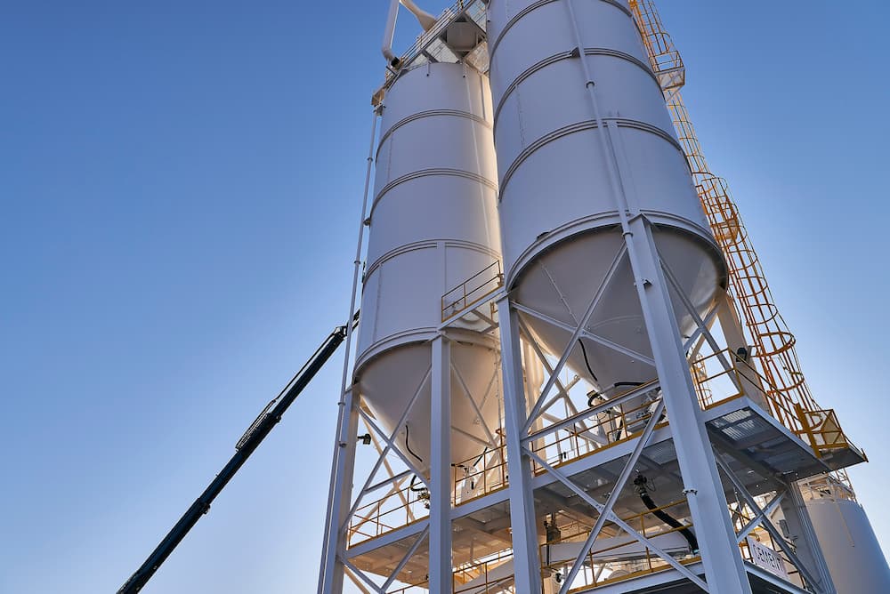 High-access industrial painting on silo tanks and support framework