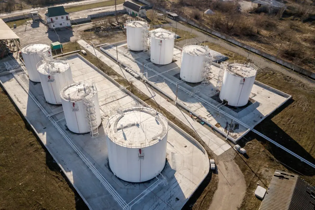 Industrial fuel storage tanks with exterior protective painting and coatings