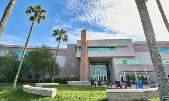 Professional exterior painting on commercial office building