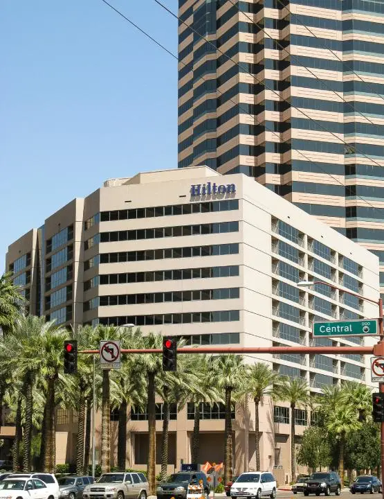 Professional exterior painting on downtown office building